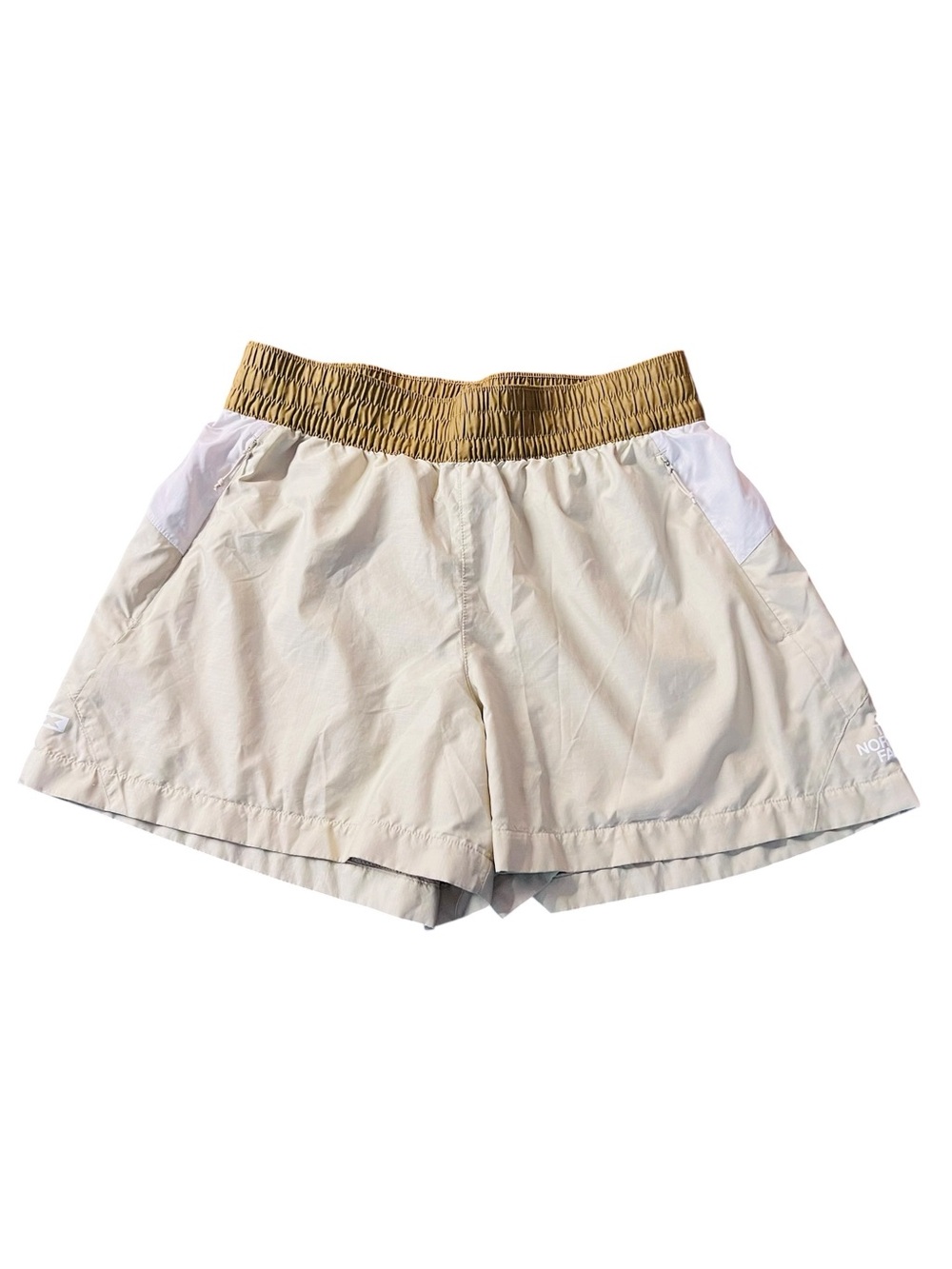 The North Face TNF X Women’s Cream Athletic Windfall Shorts with Tan Waistband